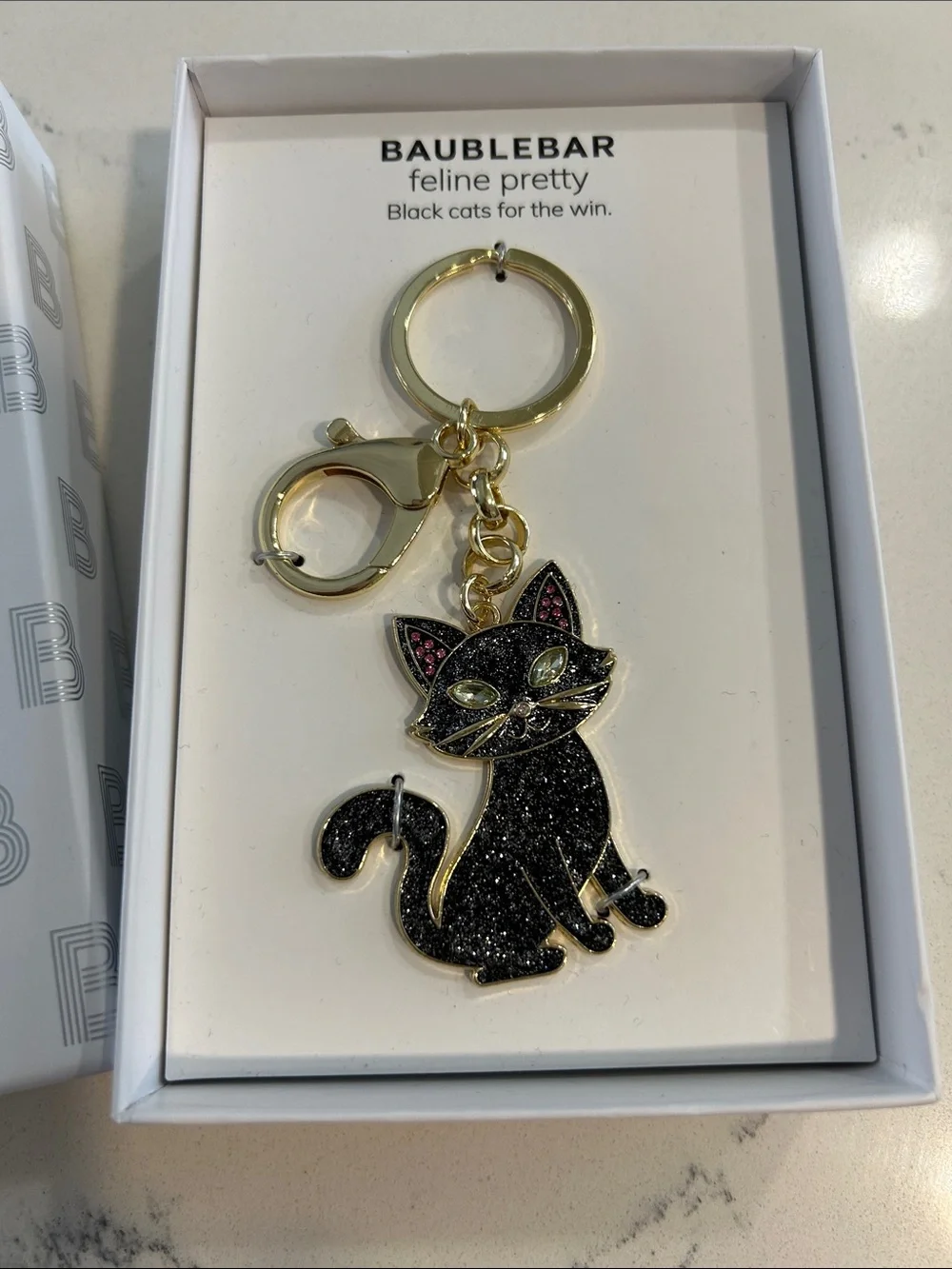 BaubleBar cat keychain
